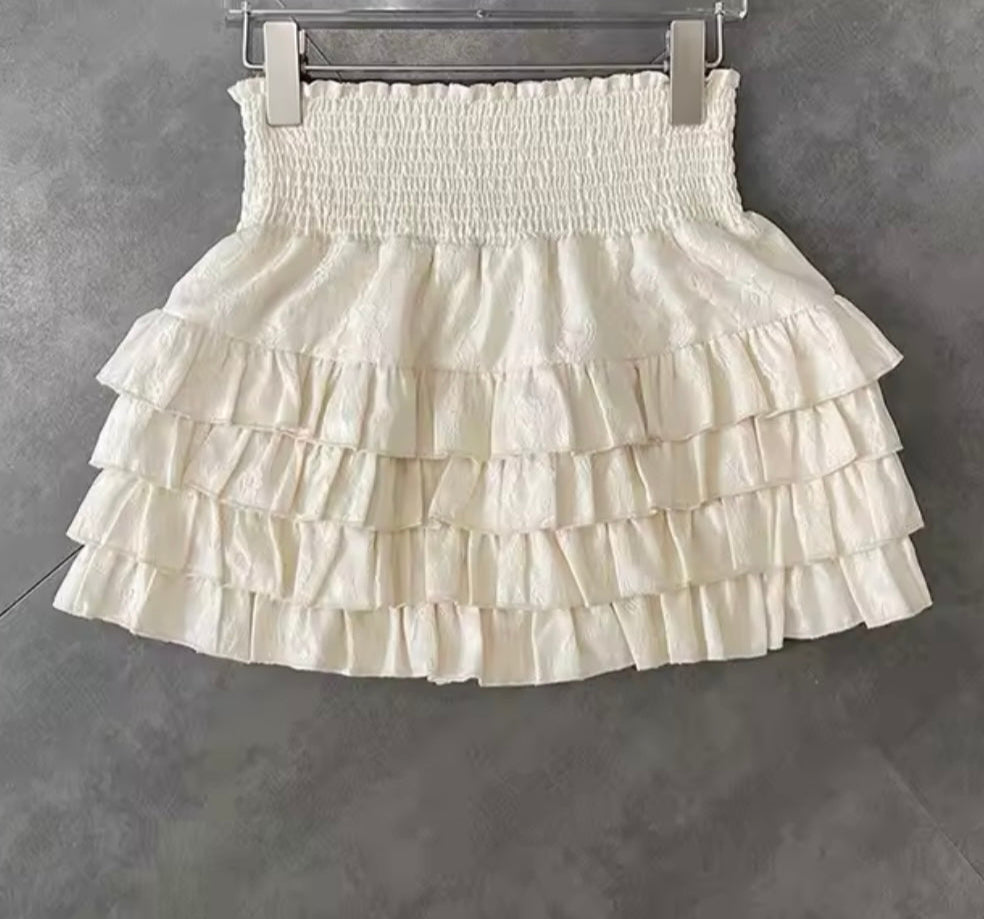 White ruffle mini skirt