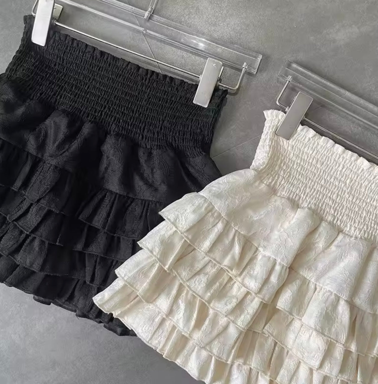 White ruffle mini skirt