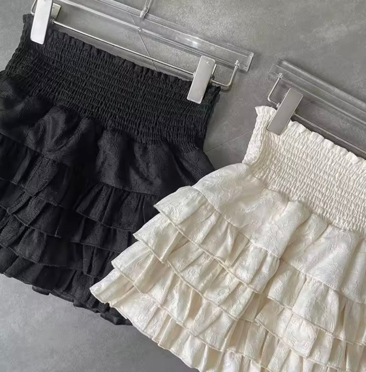 Black ruffle mini skirt