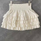 White ruffle mini skirt