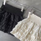 White ruffle mini skirt