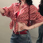 Red plaid short sleeved shirt