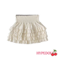 White ruffle mini skirt